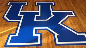 University of Kentucky logo on basketball court