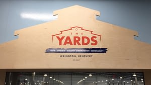 The Yards wood sign and graphic
