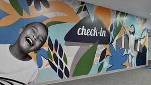 Kids check-in wall graphic