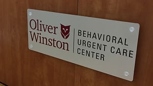 Oliver Winston Behavioral urgent care center door sign graphic